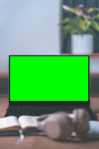 laptop computer with a green screen 