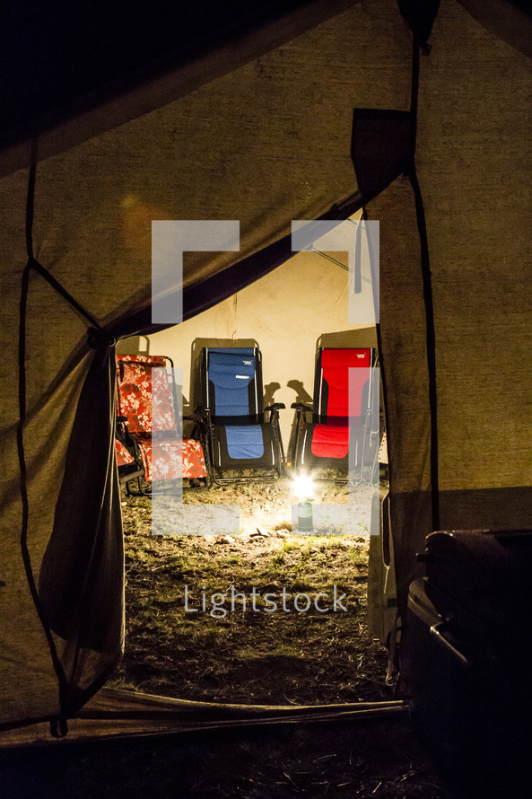 a glowing lantern in a tent 