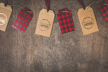 Merry Christmas and plaid gift tags on twine 
