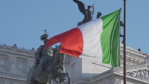 Flag of Italy in Slow Motion, Italian Tricolour National Symbol Green, White and Red - in front of Altar of the Fatherland Altare della Patria in The City of Rome