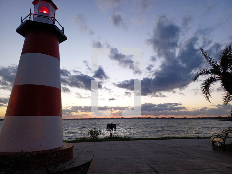 red and white striped lighthouse 