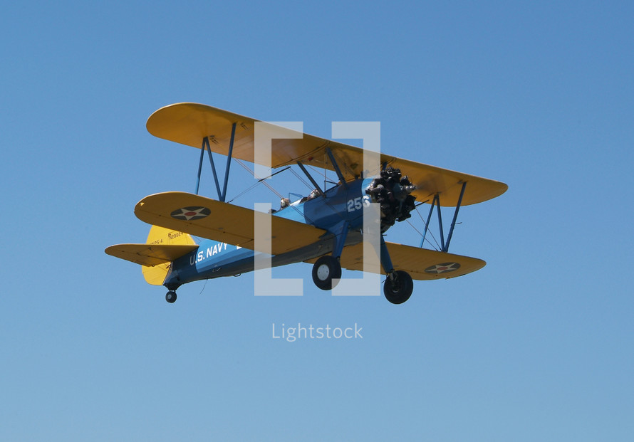 double wing aircraft in flight. Biplane. 