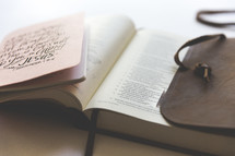 prayer journal on a Bible 