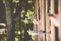 shooting guns at a gun range