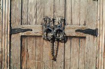 old wooden door with chain lock