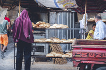 bread for sale at an outdoor market in Egypt 