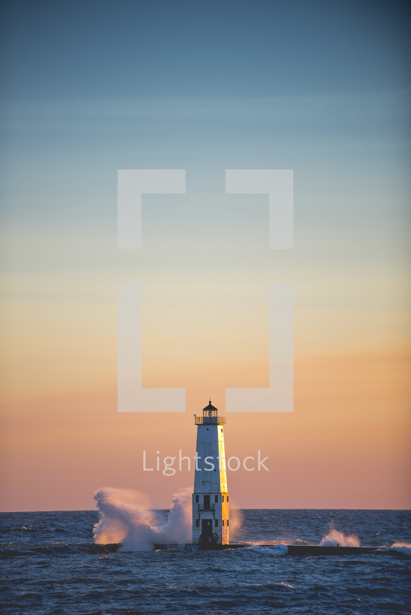 lighthouse and waves