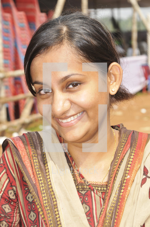Smiling Indian woman in Sari