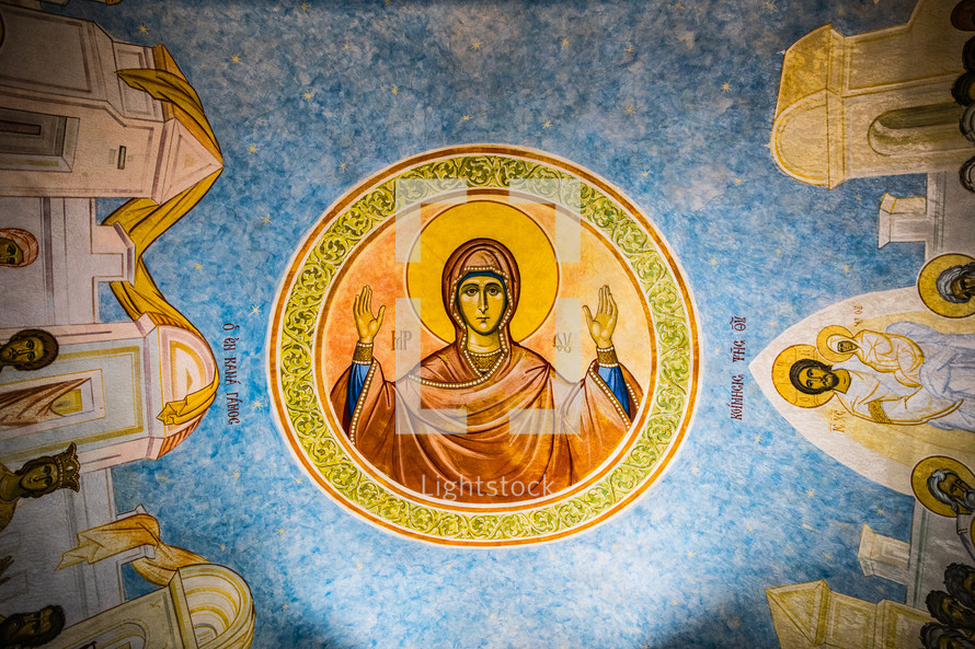 biblical paintings on a ceiling of an ancient church 