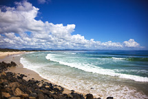 tide washing onto a beach in Australia 