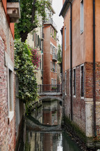 bridge over a narrow canal in Venice 