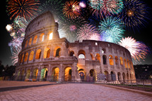 Colorful Fireworks above the Colosseum in Rome, Italy. Celebrating New Years Eve
