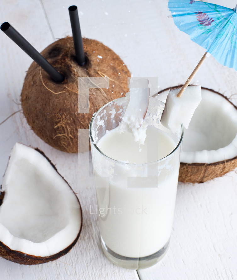 Coconut milk, summer drink on white background