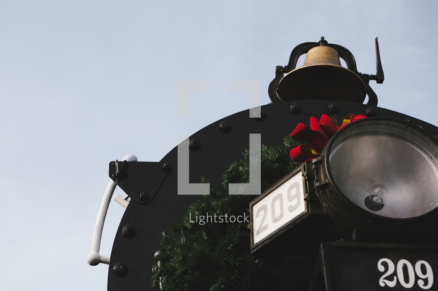A train engine decorated for Christmas