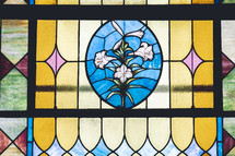 stained glass window of Easter lilies 