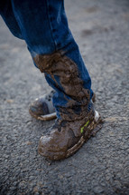 muddy shoes and pants 