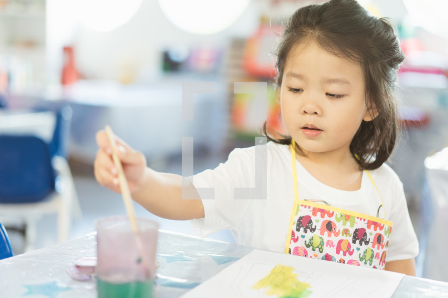 child in an apron painting 