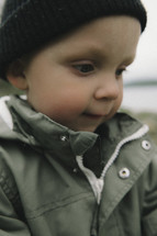 toddler boy in a beanie 