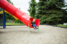 a child on a slide 