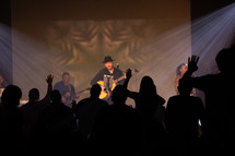 worship leaders on stage playing music 