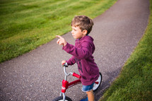a child on a training bike 