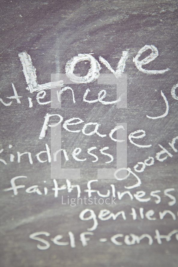 The Fruit of the Spirit - Love, Peace, Kindness, Faithfulness, goodness, Patience, self-control written on a chalkboard 