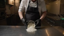 Chef Is Pouring The Flour For Making Homemade Tagliatelle Pasta