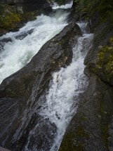 rushing water over rocks 