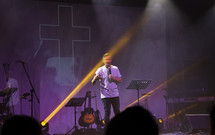 preacher holding a microphone 