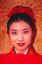 Japanese Woman in kimono and parasol 