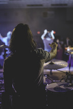 drummer on stage at a concert 