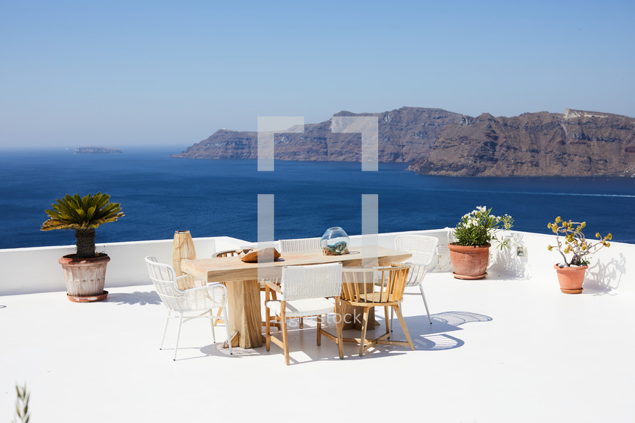 outdoor table on a rooftop balcony in Greece 