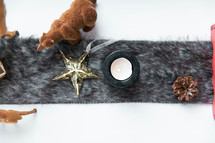 decorations on a fur runner for Christmas 