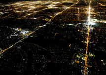 aerial view over a city at night 