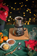Pour over coffee with treats in a Christmas scene