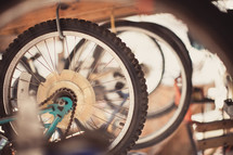 Suspended bicycle wheels.