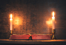 candles and open Bible 