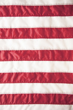 Red and white stripes of an American flag.