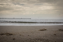 a tide washing onto a beach 