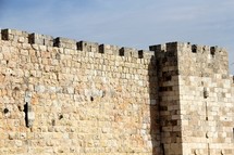 Jerusalem city wall. Stone wall with a castle edge.