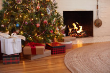 modern home gifts under a christmas tree 