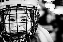 child in a hockey mask