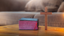 Bible and cross on a table 
