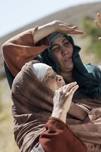 biblical women cover their faces 