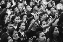 Hands raised during a worship service 