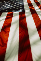 shadows on an American flag 