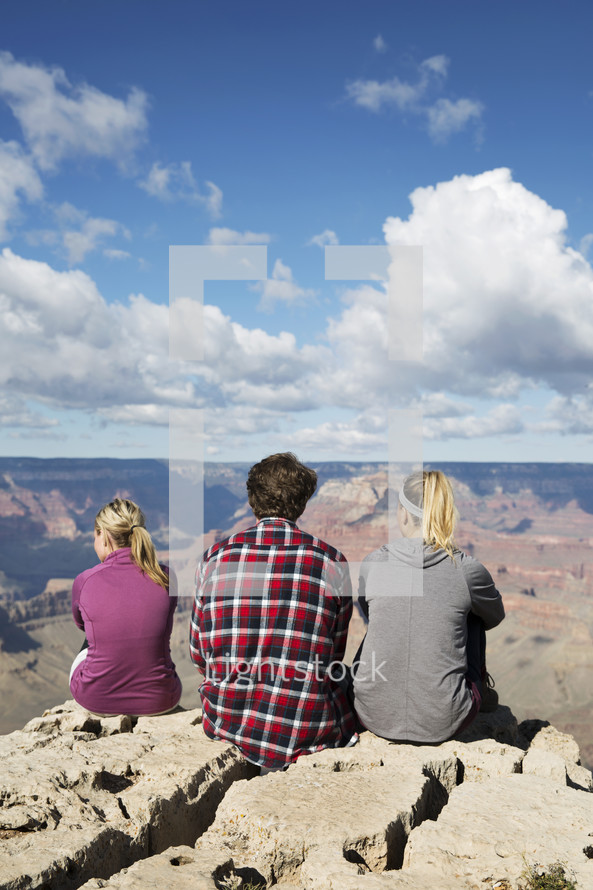 friends, woman, cliff, edge, thinking, looking out, canyon, sitting, man