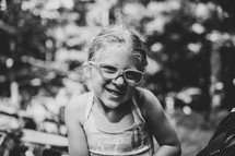 little girl in glasses 