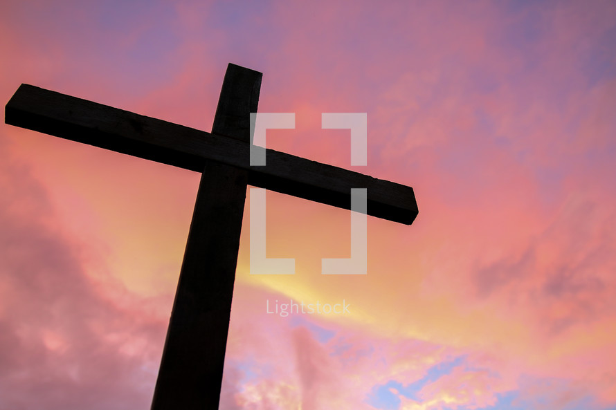 silhouette of a cross at sunset 
