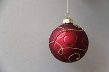 red and gold hanging Christmas ornament 
